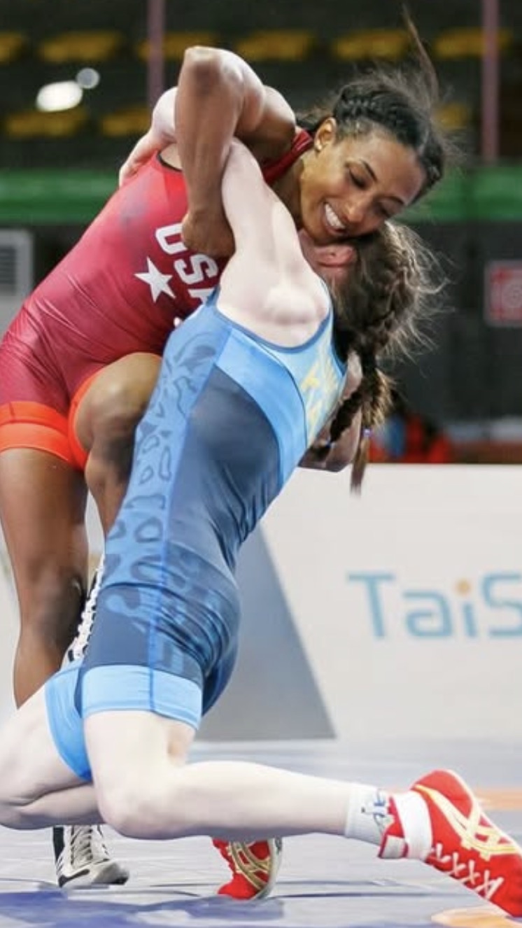 Victoria Anthony scoring a throw in the red Team USA singlet